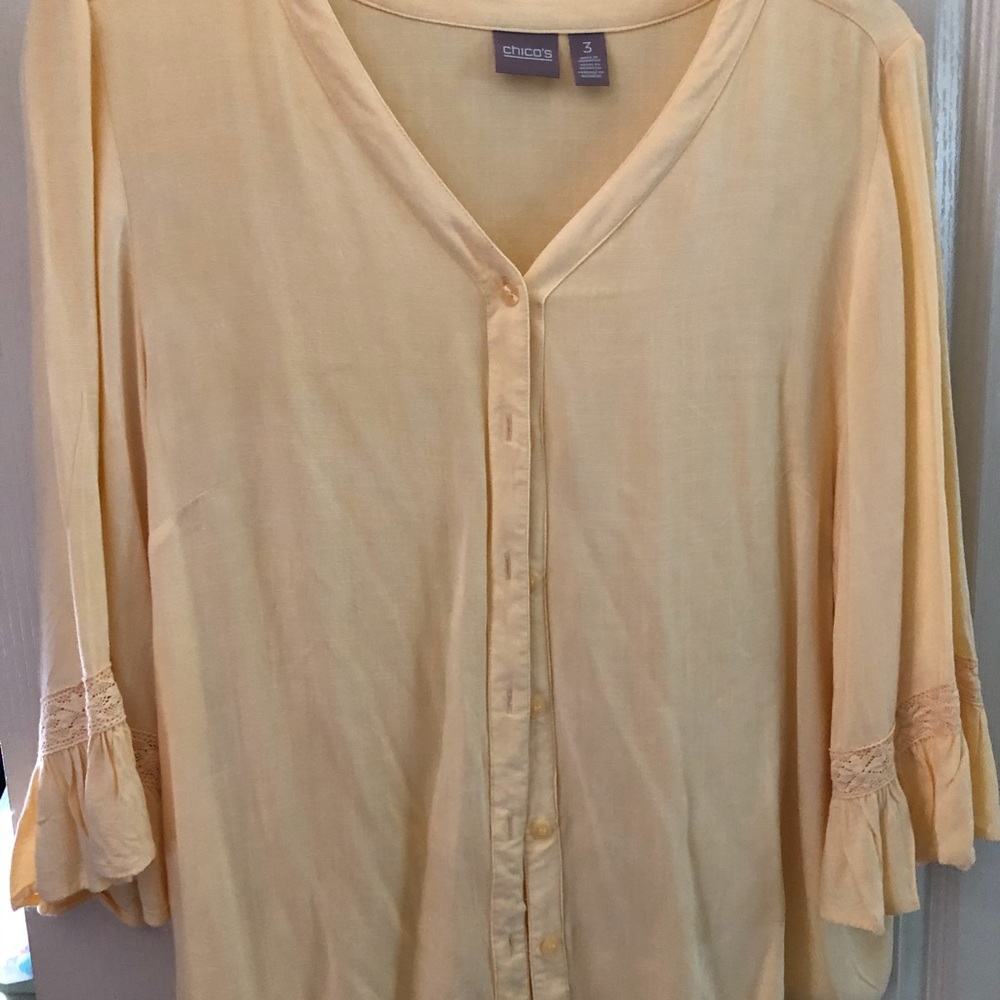 Chico’s butter colored button up blouse!